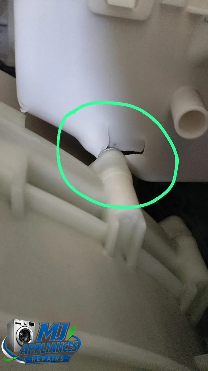 Cracked soap dispenser housing outlet on a Hisense front loader, the source of a clean-water leak Cracked soap dispenser housing outlet on a Hisense front loader, the source of a clean-water leak